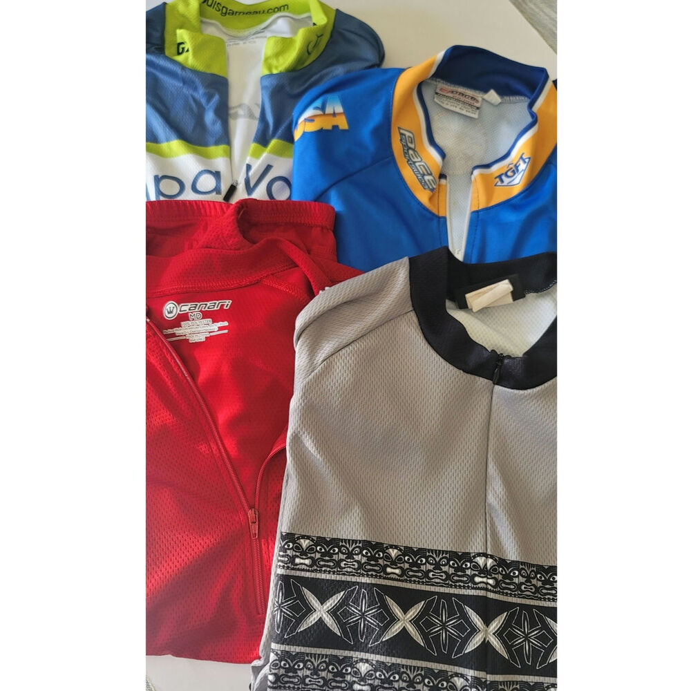 Lot of 4 Cycling Jerseys Size Medium